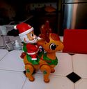 Santa Musical Riding Deer